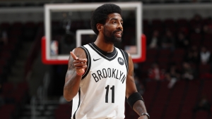 Irving standing by vaccine decision but has no retirement plans amid Nets ban