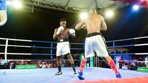  Pro boxer, Juezier “Iron Man” Heron (left) eyes his opponent Darrion “Avatar” Weir before making his next move during the first staging of the Wray &amp; Nephew Fight Nights boxing series held at Cling Cling Oval in Olympic Gardens on July 1, 2023.