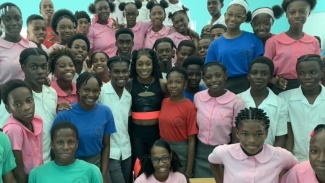 Five-time Olympic gold medallist ElaineThompson-Herah creates a stir with visit to Antigua&#039;s Princess Margaret School