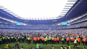 Man City launch investigation after Olsen &#039;assault&#039; during pitch invasion