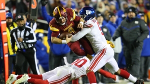 Giants withstand Commanders charge to claim key NFC victory in playoffs push