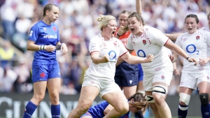 England hold off France fightback to clinch Grand Slam in front of record crowd
