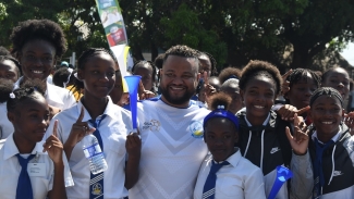 Express Canteen chairman and Chairman of the Board for the Hydel Group of Schools, Ryan Foster, with members of the Hydel track team that won the girls&#039; title at the 2023 ISSA GraceKennedy Championships last weekend. Express Canteen is donating JMD$250,000 to the school&#039;s Penn Relay team.