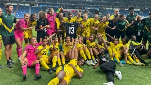 Jamaica&#039;s Reggae Girlz and staff celebrate after securing World Cup qualification in Mexico