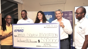Karen Anderson (L), president of the Jamaica Squash Association happily accepted the $550,000 sponsorship cheque from Rajan Trehan, country managing partner at KPMG (2nd R) who has been sponsoring the league since its inception. Sharing in the happy moment were Damion Reid (2ndL) - partner at KPMG, Sanjana Nallapati of MADS team and Omar O&#039;Connor of Saints team. The presentation was made at the launch which was held recently at the Liguanea Club, home of the Jamaica Squash Association.