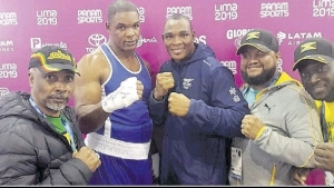 Jamaica&#039;s super heavyweight boxer, Ricardo Brown (centre), celebrates winning the Pan Am Games bronze medal in Lima, Peru, with the man who beat him in the semis, Colombia&#039;s Salzedo Codazzi and, coach Gilbert Vaz (right) and Jamaica Olympic Association (JOA) President, Christopher Samuda (left) and JOA General Secretary/CEO, Ryan Foster (second right).
