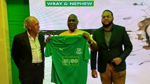 President of Real Mona FC, Peter Moses (left) alongside KSAFA President Mark Bennett (middle) and J Wray &amp; Nephew Public Relations and Communications Manager Dominic Bell (right).