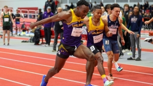 Shakur Williams winning the 60m dash at the America East Indoor Track and Field Championships.